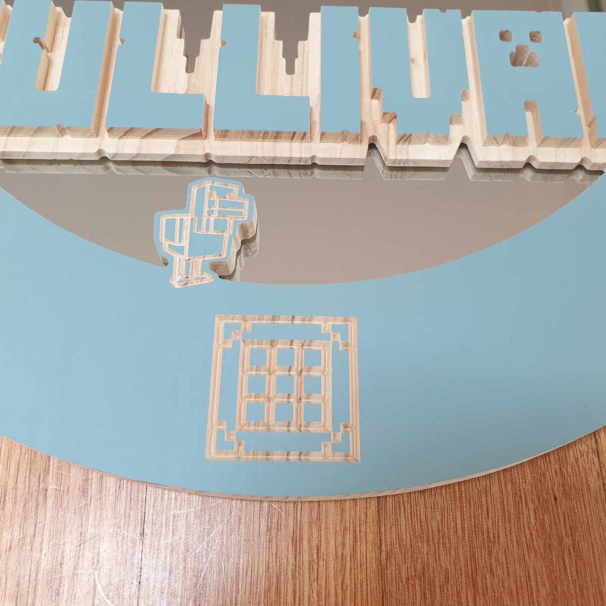 Custom themed personalised wooden mirror with name and decorative design